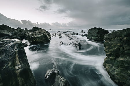 large rocks with bodies of water thumbnail