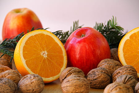 sliced orange beside apple fruit thumbnail