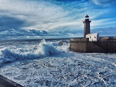 gray lighthouse during daytime thumbnail