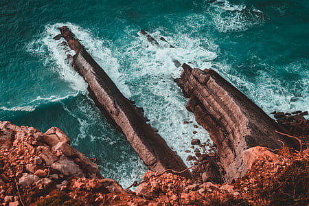 aerial view of rock structure covered with water thumbnail