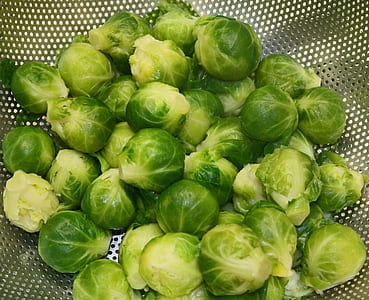 pile of cabbages on top of grey colander thumbnail