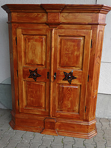 closed brown wooden 2-door cabinet thumbnail