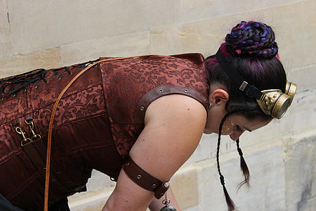 women's wearing brown steampunk fantasy costume and goggles thumbnail