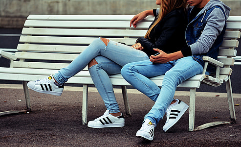 couple wearing blue jeans thumbnail
