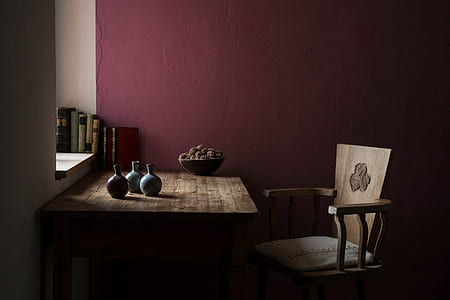 chair beside desk near wall inside room thumbnail