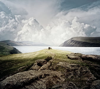 cliff near body of water thumbnail