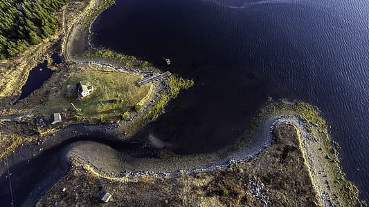 aerial view of island beside body of water thumbnail