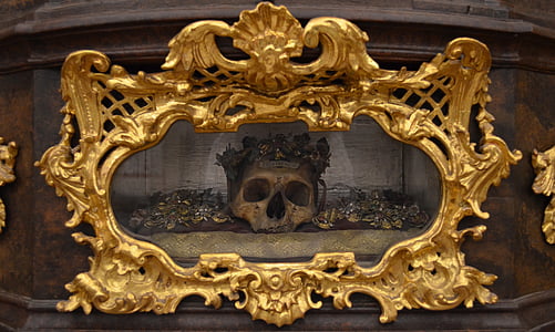 skull decor in brass-colored enclosure thumbnail