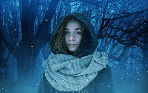 woman standing near trees during winter thumbnail