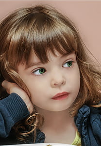 girl with green eyes wearing black zip-up jacket thumbnail