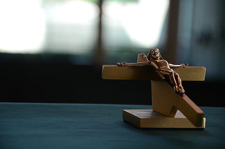brown crucifix on top thumbnail