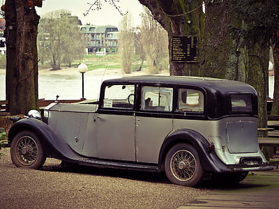 classic gray sedan in park thumbnail