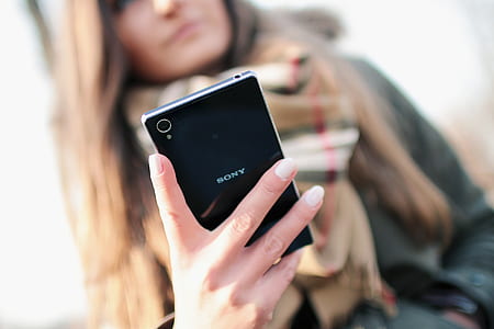 person, woman, hand, smartphone thumbnail