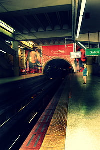 woman standing in subway terminal thumbnail