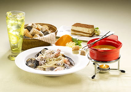 assorted cooked dishes on beige surface thumbnail