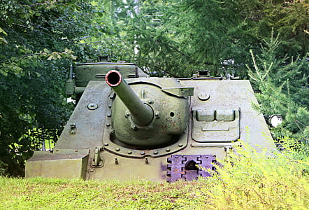 brown panzer tank near trees thumbnail