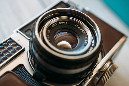 black and gray DSLR camera thumbnail