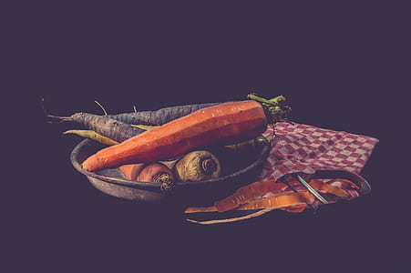 three carrots on gray plate thumbnail