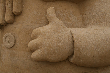 statue posturing thumbs up thumbnail