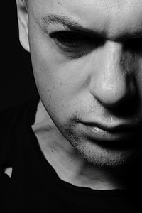 grayscale photography of an in black crew-neck top thumbnail