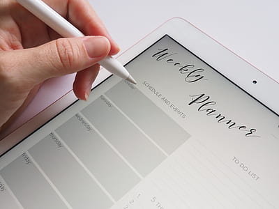 person holding stylus pen white tablet computer thumbnail