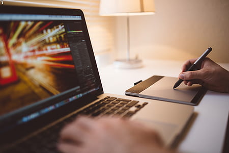 MacBook Pro beside track pad thumbnail