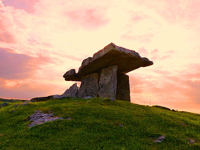 gray stone on green high mountain photo taken during daytime thumbnail