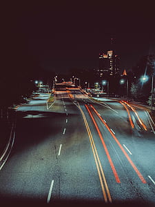 timelapse photography of road during nighttime thumbnail