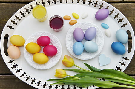 assorted-color egg lot on white plate thumbnail
