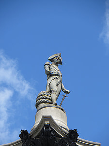 man holding sword concrete statue thumbnail