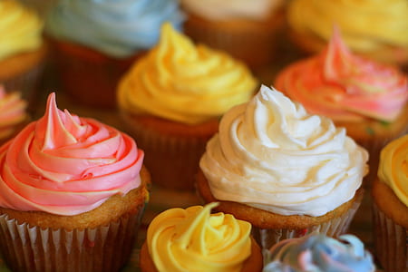 tilt shift closeup photo of cupcakes thumbnail