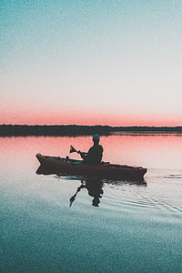 man riding kayak on flatwater thumbnail