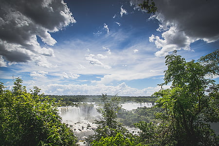 waterfalls under cloudy sky thumbnail