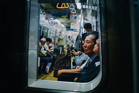 people sitting inside train thumbnail