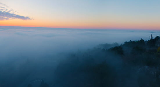 mountain covering with fog thumbnail