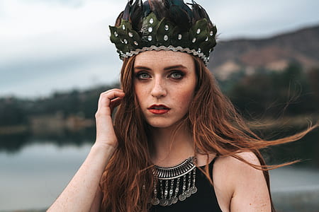woman wearing black camisole and black headdress close-up photography thumbnail