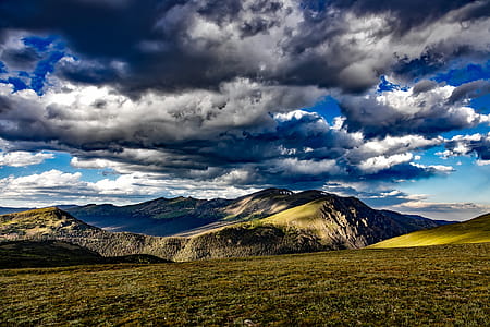 Landscape Photograph of Green Brown Hills at Daytime thumbnail