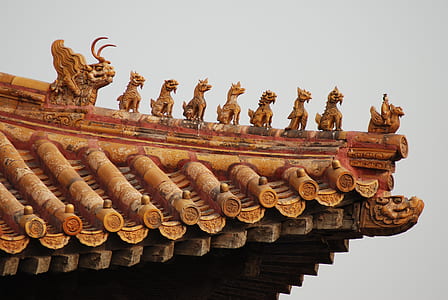 brown wooden shrine under white sky thumbnail