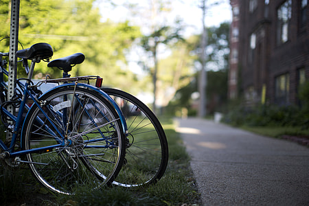 two blue bicycles selective focus photography thumbnail
