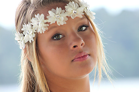 woman wearing white floral crown thumbnail