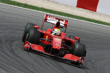 red formula 1 car on track thumbnail