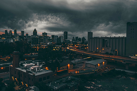 Black Clouds over the Night Time Cityscape of Montreal, Quebec, Canada thumbnail