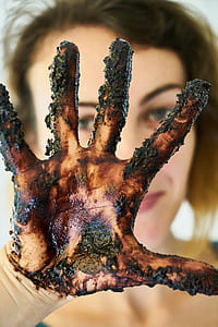 stained hand of woman thumbnail
