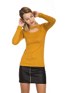 woman standing while holding her hair thumbnail
