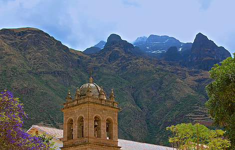 brown stone castle near mountain thumbnail