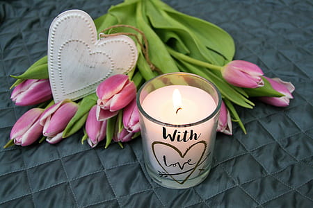 white candle with pink flowers thumbnail