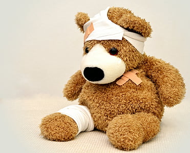 brown injured bear plush toy thumbnail