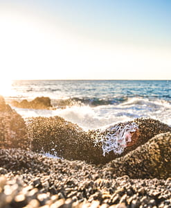 water splashing on rock thumbnail