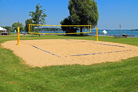 yellow beach volleyball court during daytime thumbnail