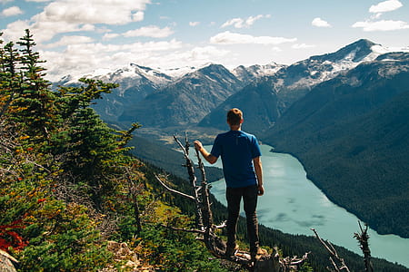 man standing on mountain thumbnail